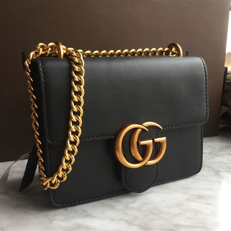 gucci backpack gold chain|Gucci purse with gold chain.